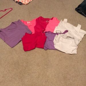 9 pack of tank tops and camis. Sizes 7-10.